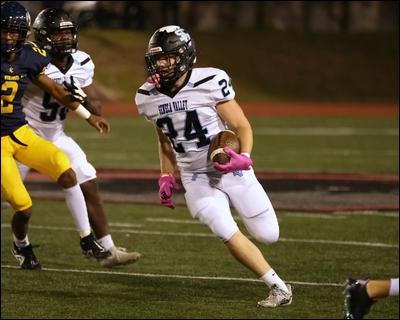 Seneca Valley's Nollan Dworek finds a hole on a run against Central Catholic Friday in Pittsburgh.