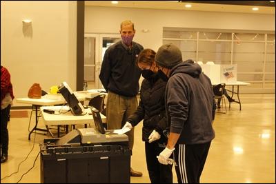 Anya Conway, 18, votes for the first time with her dad, Bill Conway, at Grace Community Church in Cranberry Township.